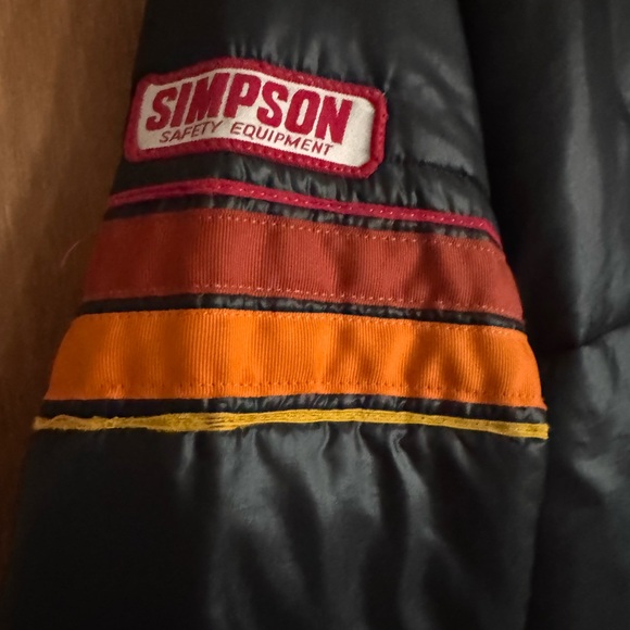 Stylish Black Puffer Jacket with Red and Orange Stripes - Picture 3 of 6